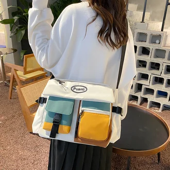Голям капацитет на нов женски 2022 найлон прилив на хладно едно рамо чанта корейската версия на цветови контраст студент кроссбоди чанти