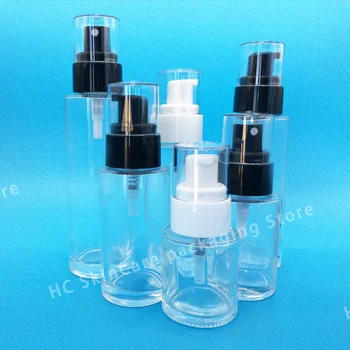 Продажбите на едро на празни стъклени бутилки на едро от прозрачен флакон-спрей с плосък рамо, козметичен контейнер за еднократна употреба с пластмасов капак